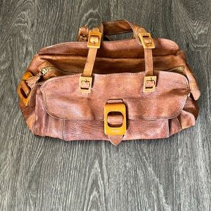 Anya Hindmarch distressed Leather purse with wooden detailing & tassel zipper